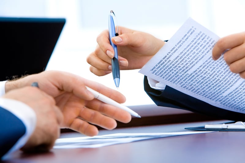 person writing in a journal